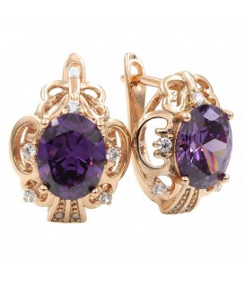 Серьги позолота Крупный овальный камень в ажурной оправе,маленькие камни по сторонам 