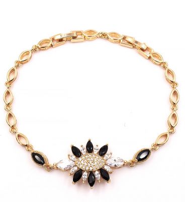 Браслет мягкий лимонная позолота "Цветок из кругл. камней(черн.)" 
