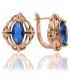 Сережки Xuping Позолота (Медичне золото) з англійської застібкою "Овальний камінець в ажурі" з синім цирконом