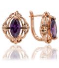 Сережки Xuping Позолота (Медичне золото) з англійської застібкою "Овальний камінець в ажурі" фіолетовий циркон