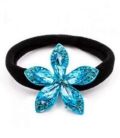 Гумка для волосся з яскравою брошкою, чорна